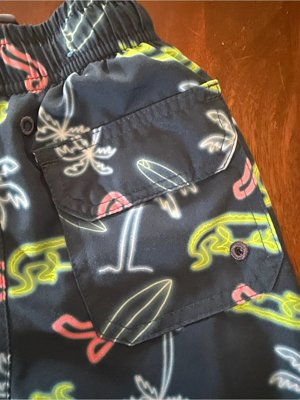 surf style Navy Swim Trunks with Neon Green, Pink and White Surf Prints